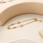 Pulseira Flor de Liz Banhada em Ouro 18k - Imagem 2